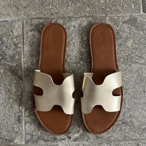 Gold slip ons. Gently worn. Great for summer. Similar to the Hermes style.